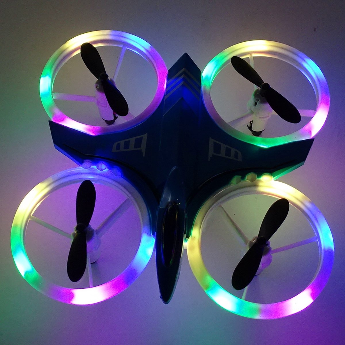 Mini drone voor kinderen - disco Ledverlichting- met controller - met extra accu- Blauwe romp - leuke gadget