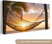 Canvas Schilderij Hangmat op het Caribische strand - 40x20 cm - Wanddecoratie