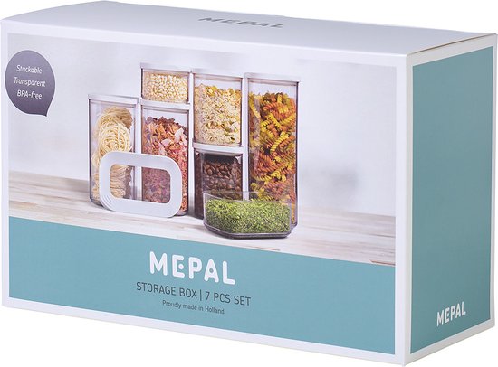 Emballage de boîtes de conservation Mepal Modula, set de 7 pièces. Sont représentées des boîtes transparentes remplies de pâtes, d'herbes, de muesli et de fruits secs.