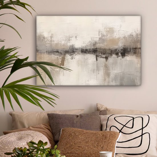 Peinture abstraite dans des tons beige, gris et brun, avec une plante au premier plan.