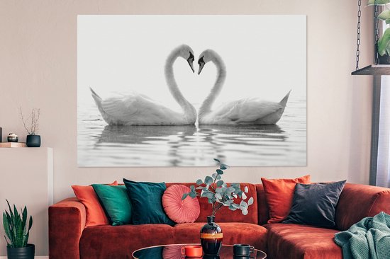 Canvas schilderij 150x100 cm - Wanddecoratie Twee zwanen die samen een hart vormen - zwart wit - Muurdecoratie woonkamer - Slaapkamer decoratie - Kamer accessoires - Schilderijen