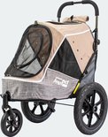 Beige hondenbuggy met grijze accenten, grote achterwielen en een kleiner zwenkwiel aan de voorkant.