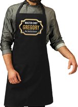 Naam cadeau Master chef Gregory keukenschort/ barbecue schort zwart voor heren/ mannen - cadeau vaderdag/ verjaardag/ Pensioen