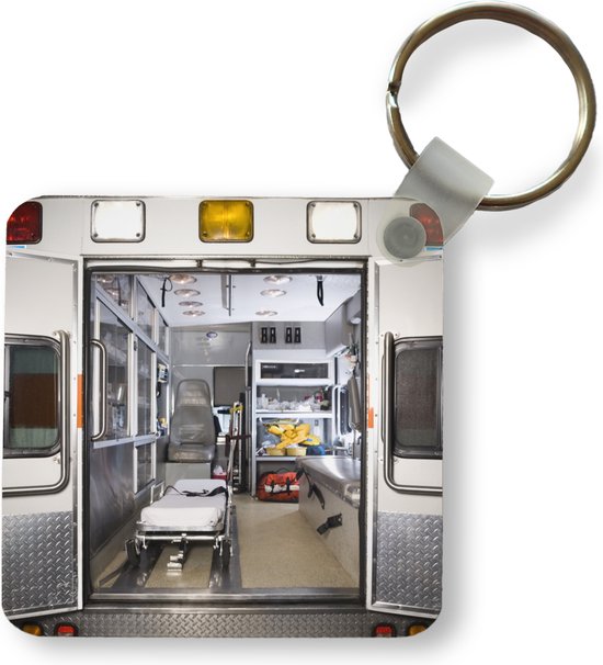 Porte-clés - Ambulance avec portes ouvertes - Plastique - Rond