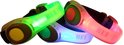 Drie Bee-Safe LED-armbanden in groen, paars en roze met de tekst 'BEE'.