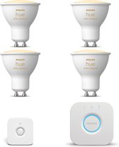 Philips Hue Starterspakket GU10 White Ambiance - 4 Hue GU10 LED lampen en Bridge - Bewegingssensor binnen - Eenvoudige Installatie - Werkt met Alexa en Google Home