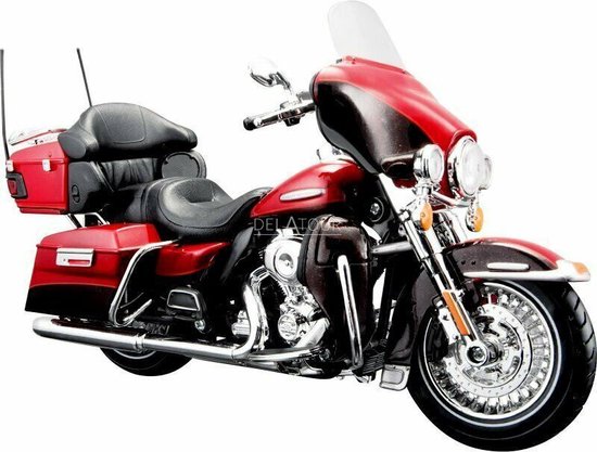Rode Harley Davidson modelmotor met zwarte stoelen en verchroomde details.