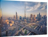Drukke verkeersaders voor de Burj Khalifa in Dubai - Foto op Canvas - 150 x 100 cm