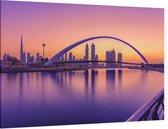Zonsopkomst zorgt voor een paarse gloed in Dubai - Foto op Canvas - 45 x 30 cm