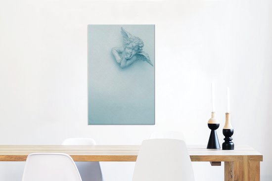 Canvas Schilderij Witte engel met een blauwe gloed - Wanddecoratie