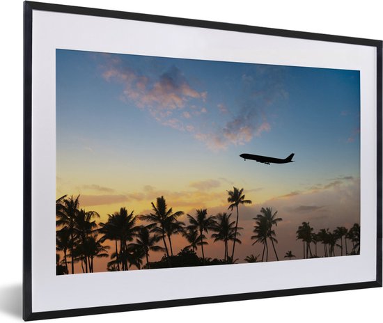 Silhouet van een vliegtuig boven de palmen fotolijst zwart met witte passe-partout klein 40x30 cm - Foto print in lijst