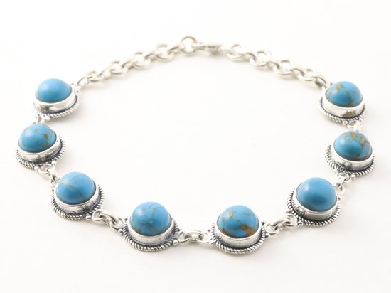 Bewerkte zilveren armband met blauwe turkoois