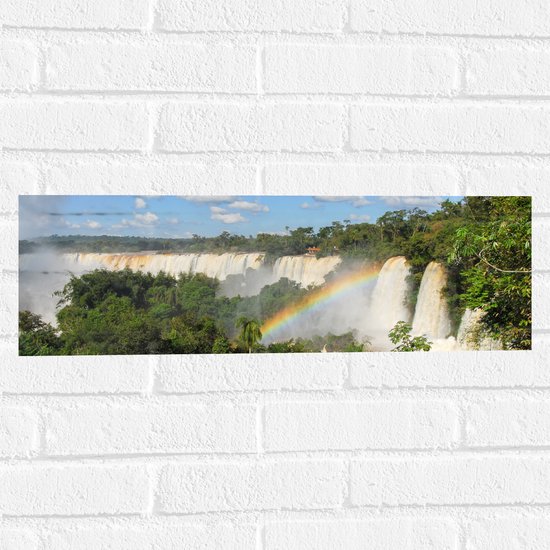 Muursticker - Regenboog bij Brede Waterval in de Jungle - 60x20 cm Foto op Muursticker
