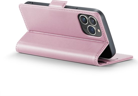 Étui portefeuille rose en similicuir, style livre, ouvert pour révéler le téléphone et les appareils photo.