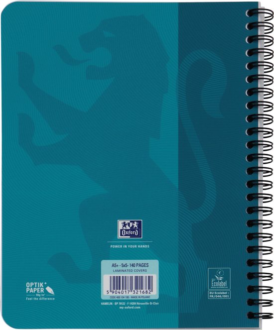 Achterkant van aquablauw notitieboek met leeuw-silhouet. 'Oxford', 'Optik Paper', 'EU Ecolabel' logo's zichtbaar.