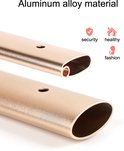 Gouden aluminium buizen van een kinderwagenframe. Tekst: 'Aluminum alloy material', 'security', 'healthy', 'fashion'.