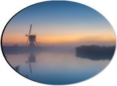 Dibond Ovaal - Mist Hangend boven het Water bij Windmolen - 28x21 cm Foto op Ovaal (Met Ophangsysteem)