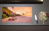 Inductieplaat Beschermer - Luxe Ligbedden op Wit Strand tijdens Feloranje Zonsondergang - 90x52 cm - 2 mm Dik - Inductie Beschermer van Vinyl