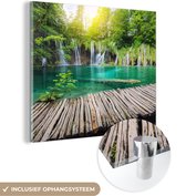 MuchoWow® Glasschilderij 50x50 cm - Schilderij acrylglas - Brug - Waterval - Natuur - Foto op glas - Schilderijen