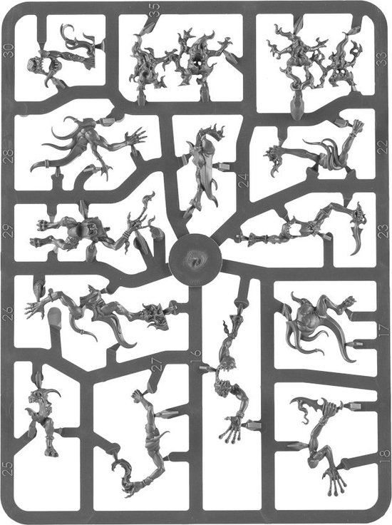 Platine grise moulée par injection avec de nombreuses petites figurines démoniaques de Tzeentch Blue Horrors.