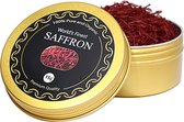 Gouden blik met 'World's Finest Saffron' etiket en gevuld met rode saffraandraadjes.