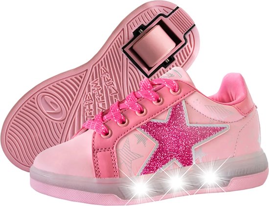 Lichtroze sneakers met veters, grote glinsterende sterren en LED-verlichting in de zool.