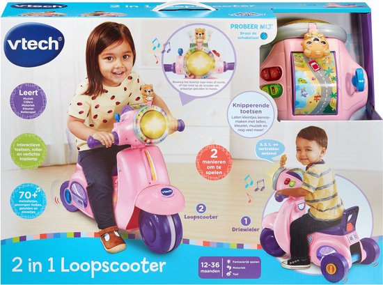Doos van roze VTech 2 in 1 loopscooter/driewieler met een meisje, jongen en speelgoed.