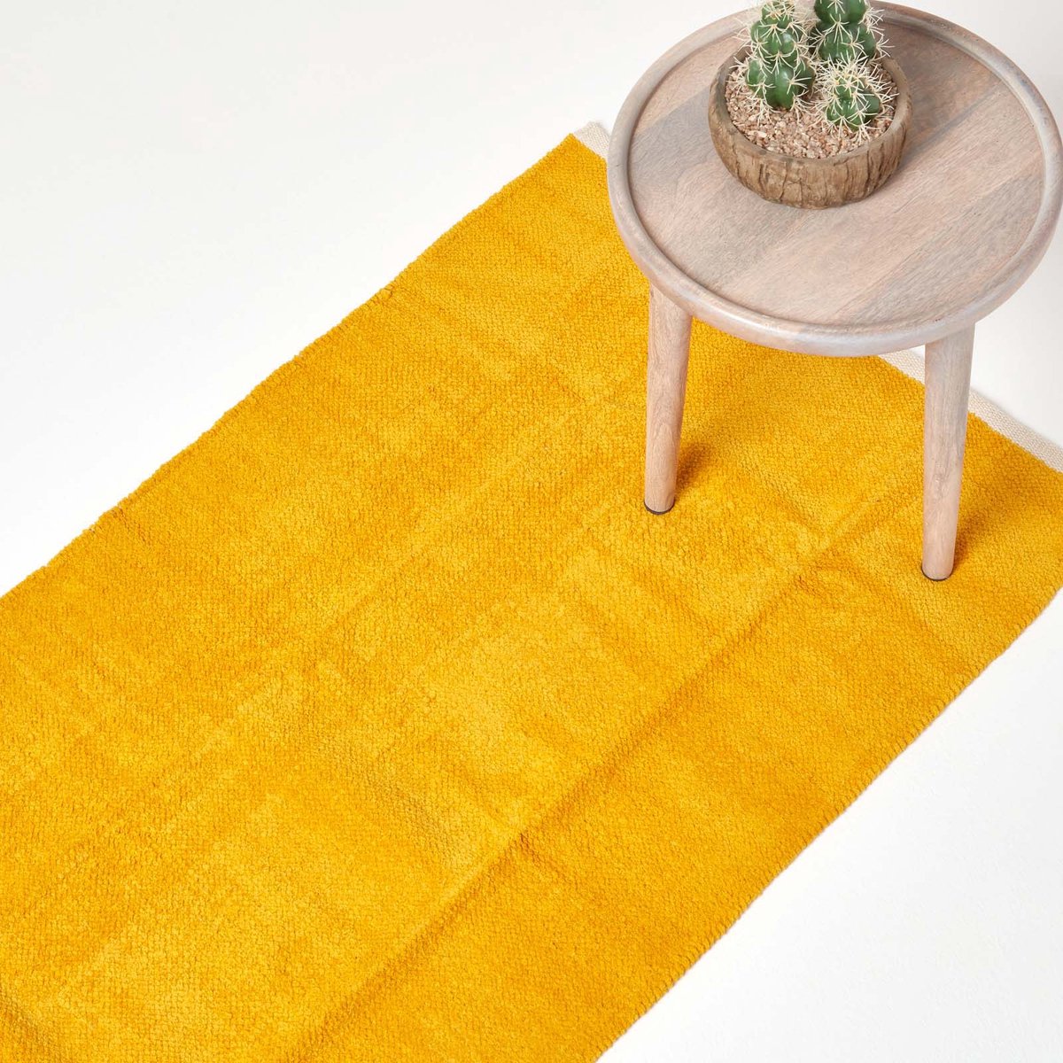 Homescapes mosterdgeel chenille vloerkleed met natuurlijke rand van 100% katoen, 66 x 200 cm