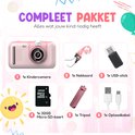 Compleet pakket roze kindercamera met accessoires: nekkoord, USB-stick, 32GB Micro SD-kaart en statief. Tekst: "Compleet Pakket".