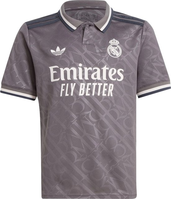 Grijs Real Madrid junior poloshirt met wit Emirates Fly Better logo, Adidas-logo en clubembleem.