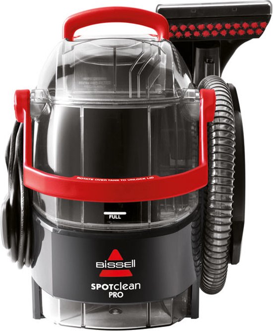Een zwarte BISSELL SpotClean Pro met rode handgreep en slang.