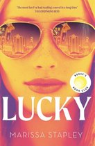 Couverture du livre 'Lucky' par Marissa Stapley, montrant une femme portant des lunettes de soleil avec des reflets d'une ville et de casinos.