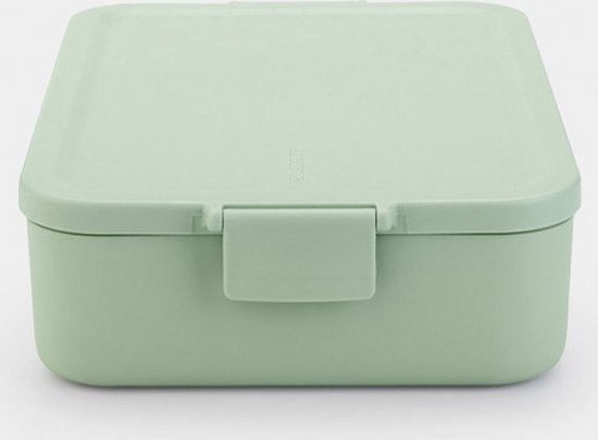 Boîte à pain Brabantia vert jade en gros plan, avec un fermoir à clip sur le devant.