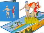 Cartes popup Popcards – Charmant couple de retraités sur une plage paradisiaque | Retraite retraite vacances plage vie plage fête bikini maxtv carte pop-up carte de voeux 3D