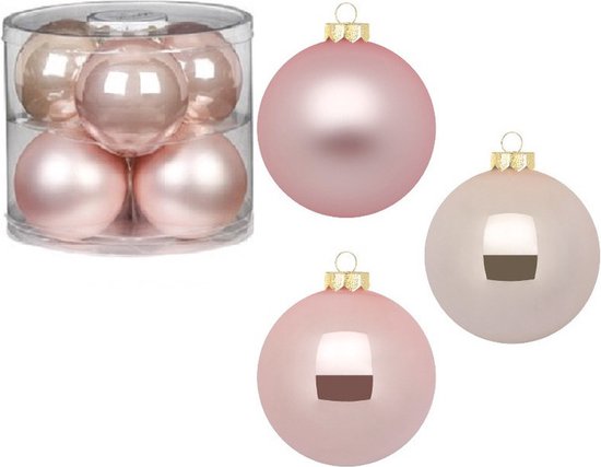 Un emballage de six boules de Noël roses à côté de trois boules de Noël roses séparées.