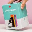 Verpakking van de 'Book Guard Bookend' met een afbeelding van de zwarte uilenboekensteun.
