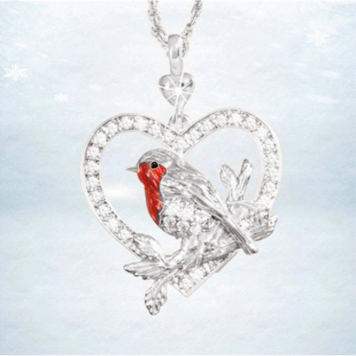 Ketting met hanger vogeltje in hart zilverkleur