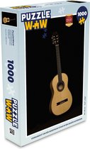 Puzzel Vooraanzicht van een akoestische gitaar op een zwarte achtergrond - Legpuzzel - Puzzel 1000 stukjes volwassenen