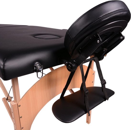 Voetensteun en verstelbare hoofdsteun van de zwarte Alora massagetafel.