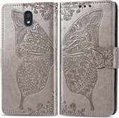 Voor LG K30 2019 Butterfly Love Flower reliÃ«f horizontale flip lederen tas met beugel lanyard kaartsleuf portemonnee (grijs)