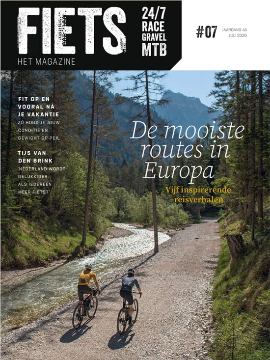 Fiets Magazine, editie 7 - 2026, met de titel 'De mooiste routes in Europa'. Twee fietsers rijden op een bosrijk pad langs een rivier.