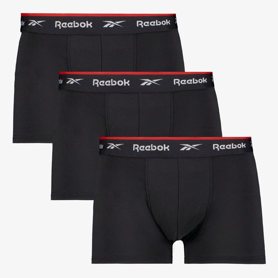 Drie zwarte Reebok boxershorts met rode en witte band met Reebok logo's.