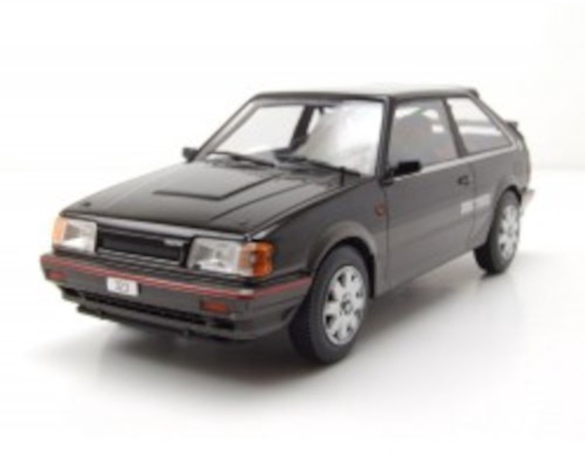 Mazda 323 4WD Turbo 1989 Zwart Modelauto 1/24 Whitebox