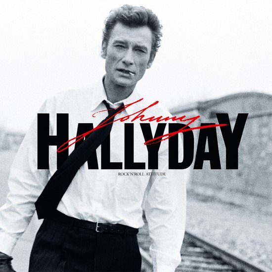 Johnny Hallyday in zwart-wit, met rode tekst 'Johnny Hallyday Rock'n'roll Attitude'.