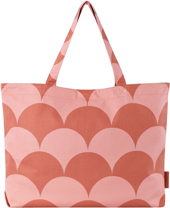 Oranje en roze tas met een patroon van halve cirkels.