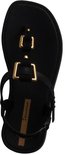 Zwarte Ipanema slipper met gouden gespen, van bovenaf gezien.