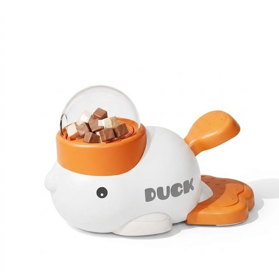 Wit eendvormig snackdispenser met oranje accenten. De transparante bovenkant is gevuld met snoepjes. Tekst 'DUCK' op de zijkant.
