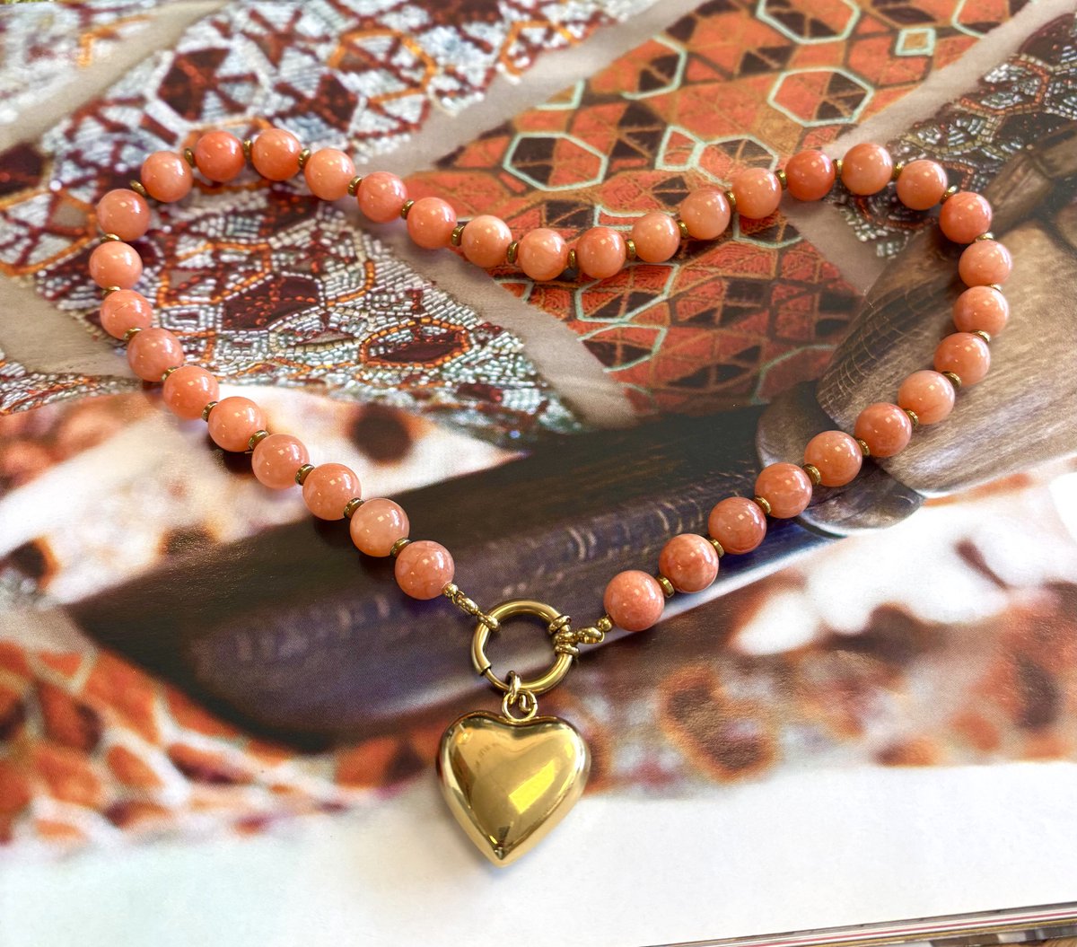 Ketting oranje chalcedoon kralen 10mm/hart goud