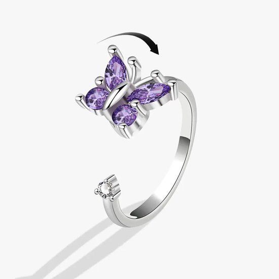 Zilverkleurige verstelbare ring met paarse vlinder hanger, draaibaar.