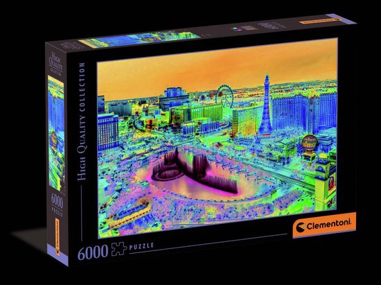 Doos van een 6000-delige puzzel met een nachtzicht van Las Vegas, inclusief de Eiffeltoren en het reuzenrad.